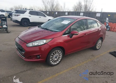 2016 Ford Fiesta Titanium z USA, uszkodzony, nr VIN 3FADP4CJ7GM158163